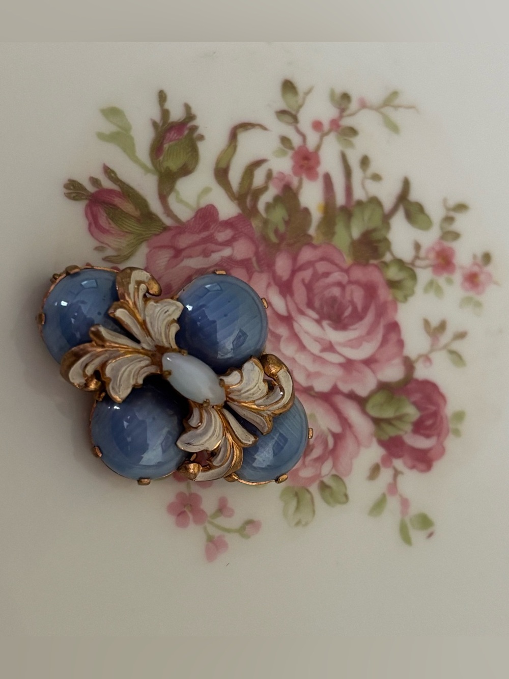Antique Blue Art Glass Cabochon Brooch with Gold Accents and white enamel.